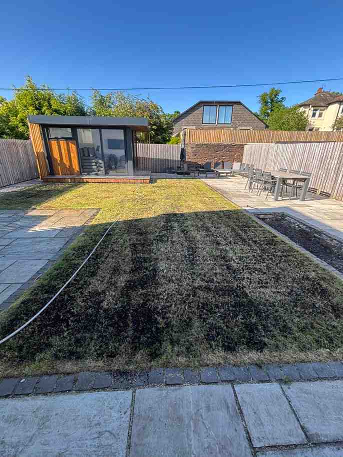 A image of a lawn that is been treated to be brought back to life with scarification and aeration green keeping techniques